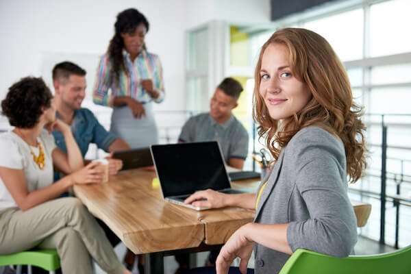 woman with laptop at biz meeting.jpg